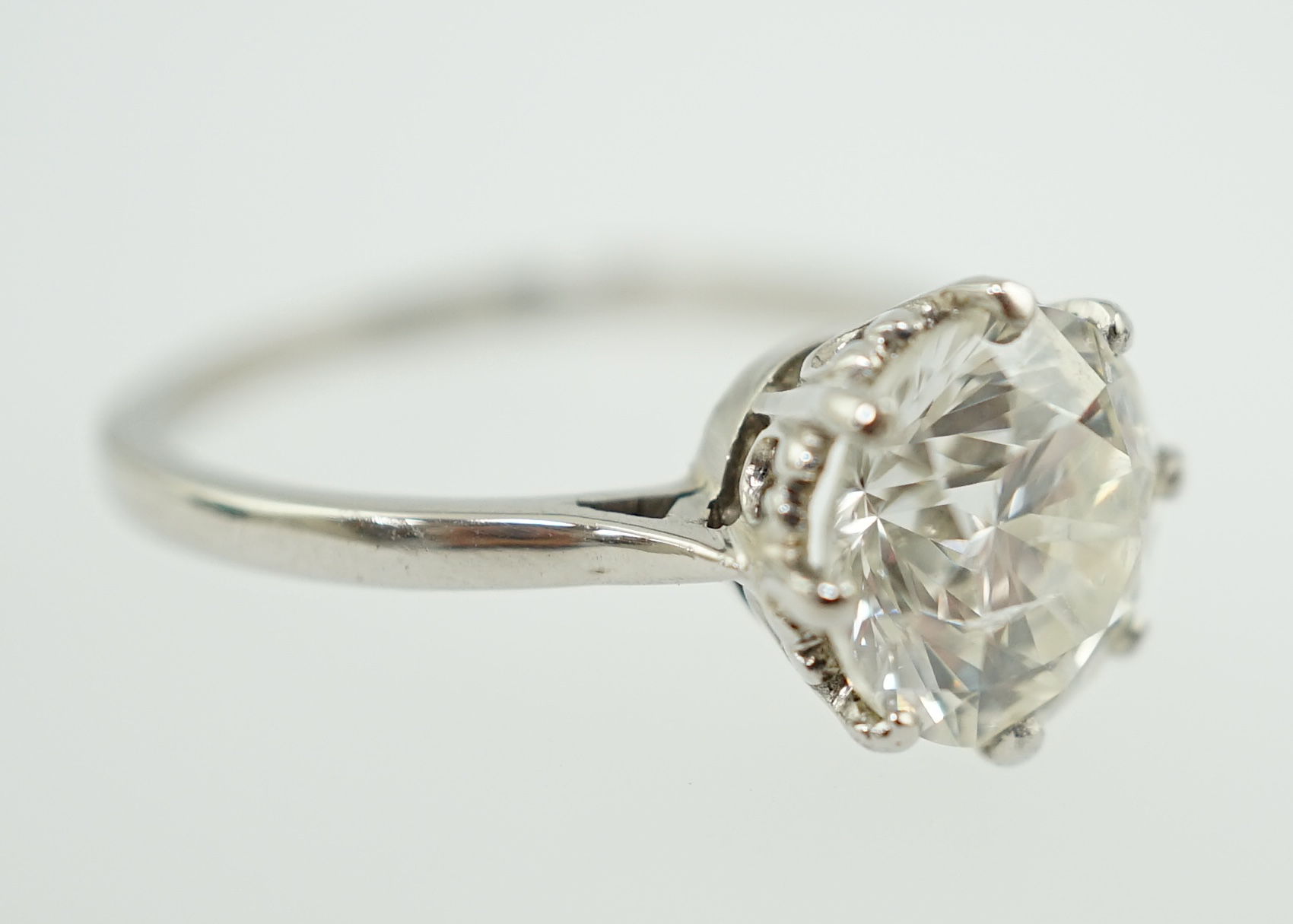 A platinum and solitaire diamond set ring